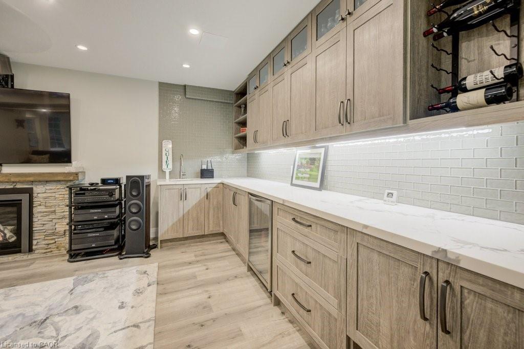 1525 Dickie Settlement Road, Cambridge, ON - Indoor Photo Showing Kitchen With Fireplace