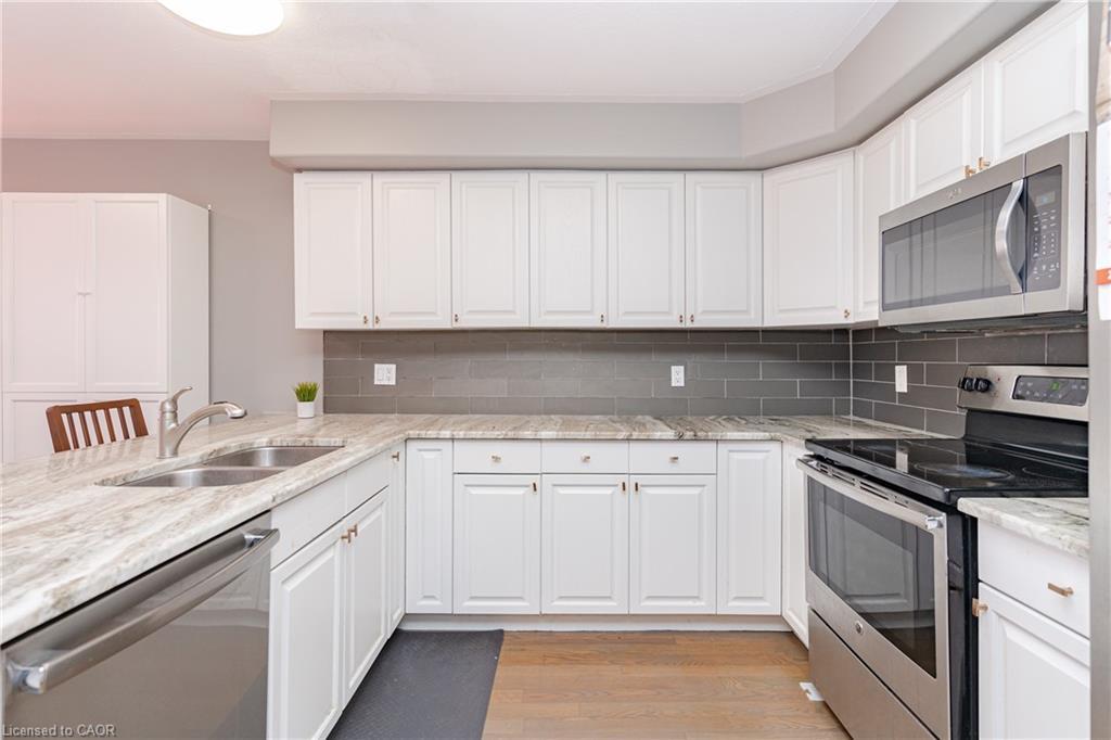 8A Hainer Street, St. Catharines, ON - Indoor Photo Showing Kitchen With Double Sink