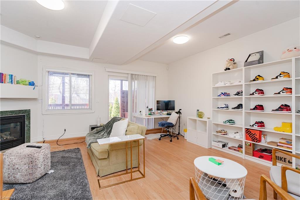 8A Hainer Street, St. Catharines, ON - Indoor Photo Showing Living Room With Fireplace