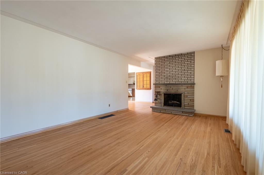 654 Hiawatha Boulevard, Ancaster, ON - Indoor Photo Showing Living Room With Fireplace