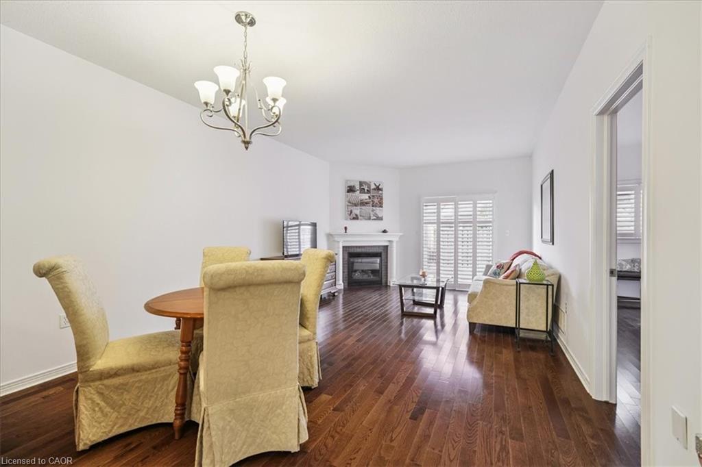 10 Cornflower Crescent, Hamilton, ON - Indoor Photo Showing Dining Room With Fireplace