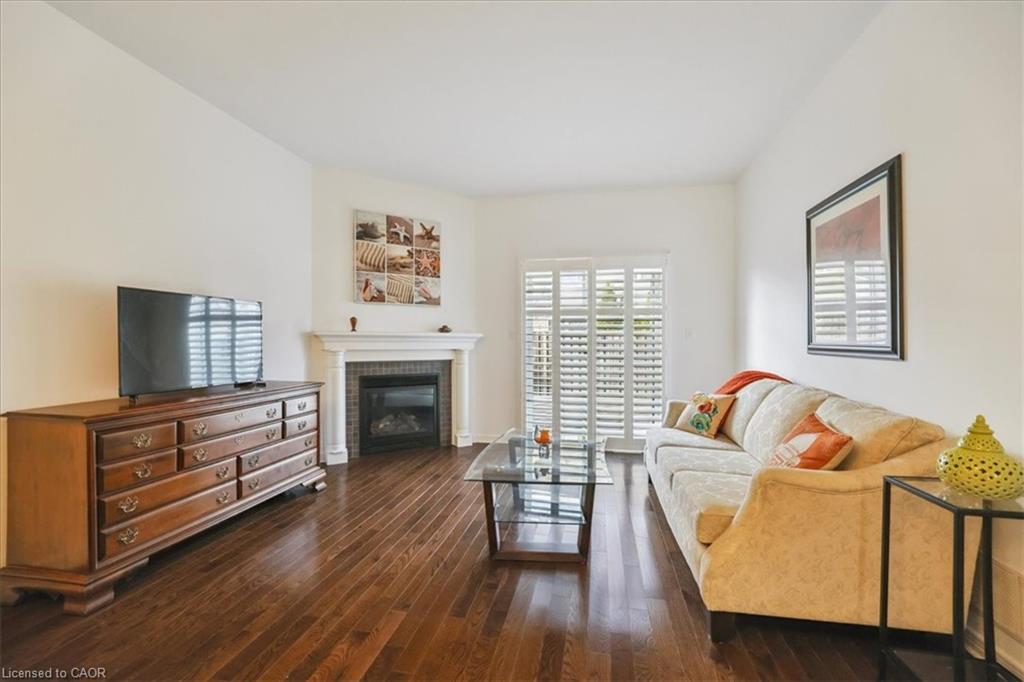 10 Cornflower Crescent, Hamilton, ON - Indoor Photo Showing Living Room With Fireplace