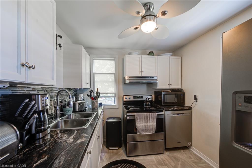 128 Dover Street, Otterville, ON - Indoor Photo Showing Kitchen With Double Sink