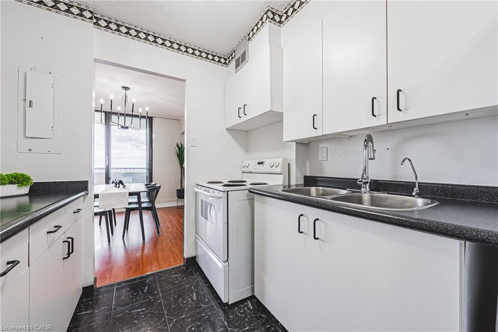 1206-2055 Upper Middle Road, Burlington, ON - Indoor Photo Showing Kitchen With Double Sink