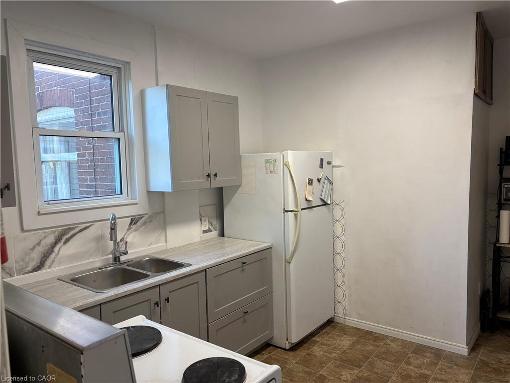24 Hunt Street, Hamilton, ON - Indoor Photo Showing Kitchen With Double Sink