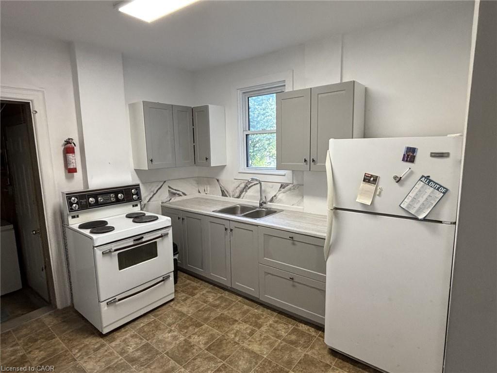 24 Hunt Street, Hamilton, ON - Indoor Photo Showing Kitchen With Double Sink