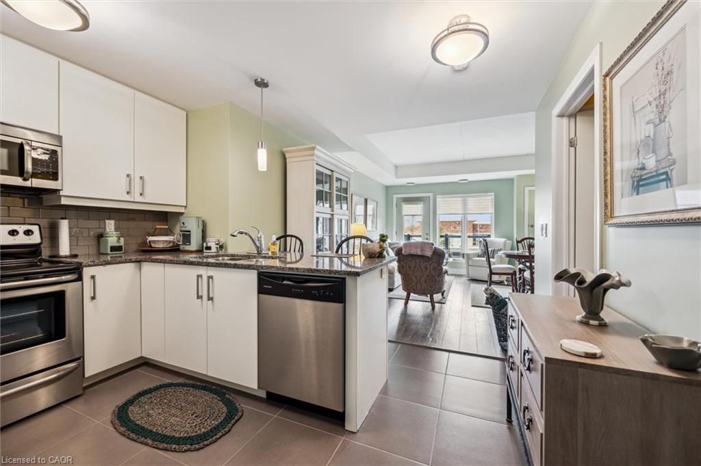 202-106 Bard Boulevard, Guelph, ON - Indoor Photo Showing Kitchen With Stainless Steel Kitchen With Double Sink