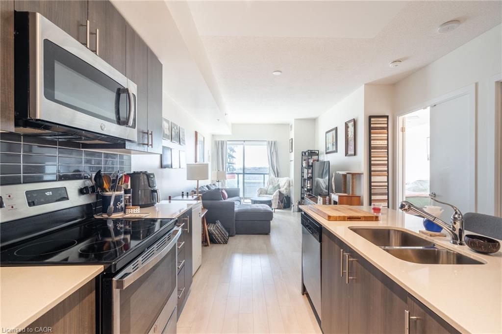 404-550 North Service Road, Grimsby, ON - Indoor Photo Showing Kitchen With Stainless Steel Kitchen With Double Sink