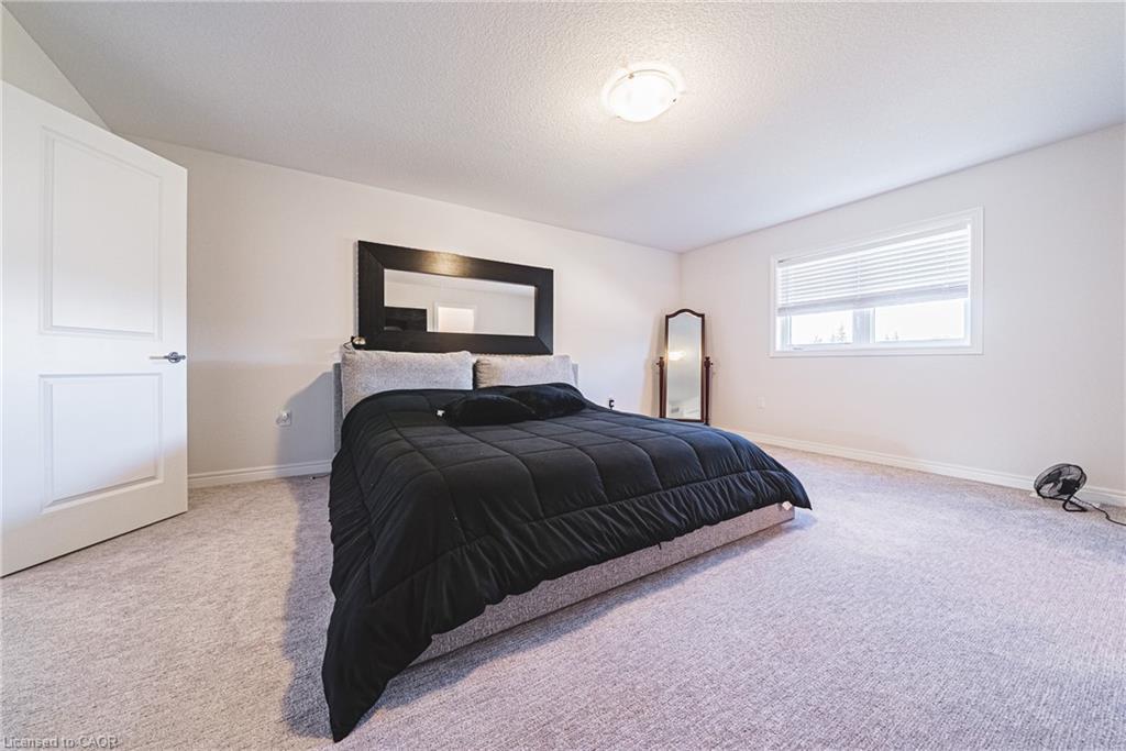 21 Zoe Lane, Binbrook, ON - Indoor Photo Showing Bedroom