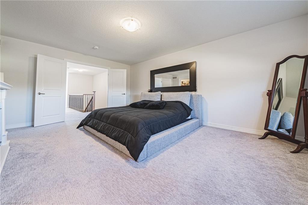 21 Zoe Lane, Binbrook, ON - Indoor Photo Showing Bedroom