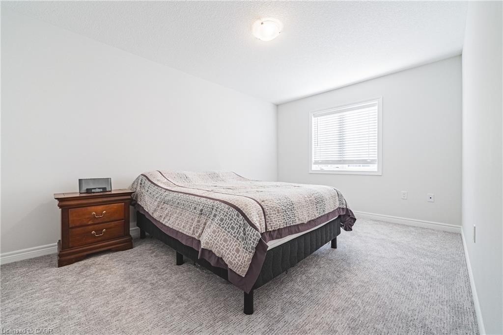21 Zoe Lane, Binbrook, ON - Indoor Photo Showing Bedroom