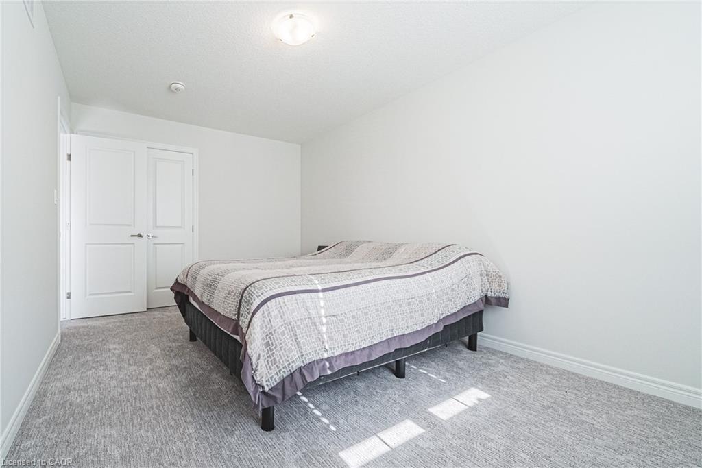 21 Zoe Lane, Binbrook, ON - Indoor Photo Showing Bedroom