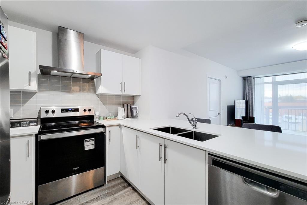217-1 Redfern Avenue, Hamilton, ON - Indoor Photo Showing Kitchen With Stainless Steel Kitchen With Double Sink