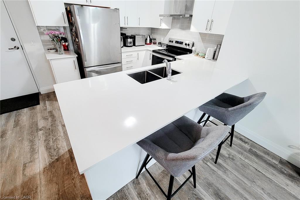 217-1 Redfern Avenue, Hamilton, ON - Indoor Photo Showing Kitchen With Stainless Steel Kitchen With Double Sink