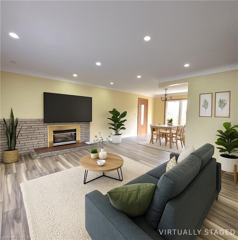 Upper-338 Grantham Avenue, St. Catharines, ON - Indoor Photo Showing Living Room With Fireplace
