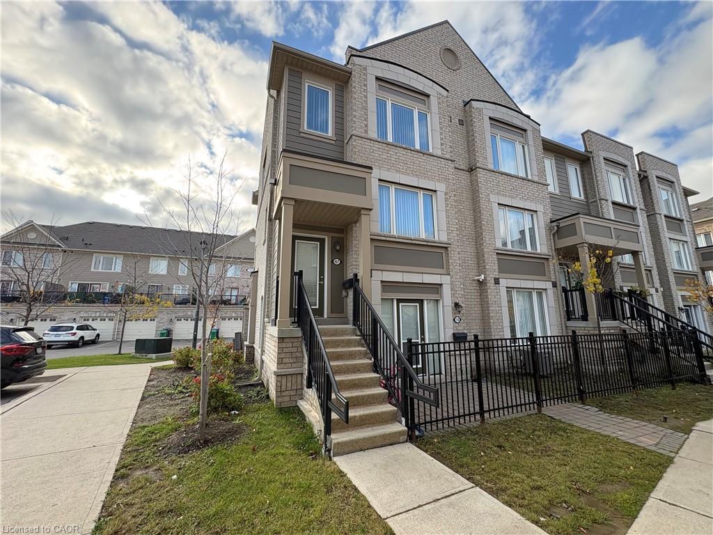 157-1 Beckenrose Court, Brampton, ON - Outdoor With Facade