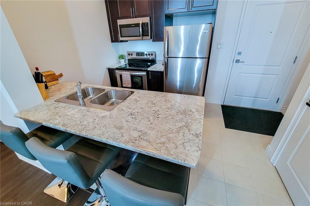 638-125 Shoreview Place, Stoney Creek, ON - Indoor Photo Showing Kitchen With Double Sink
