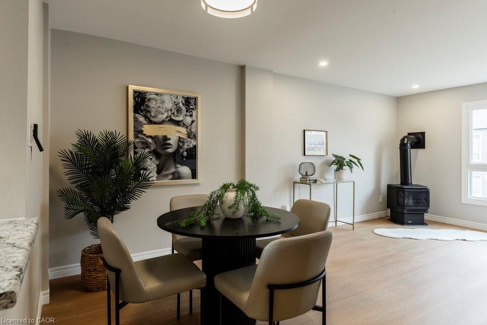 43-2050 Upper Middle Road, Burlington, ON - Indoor Photo Showing Dining Room With Fireplace