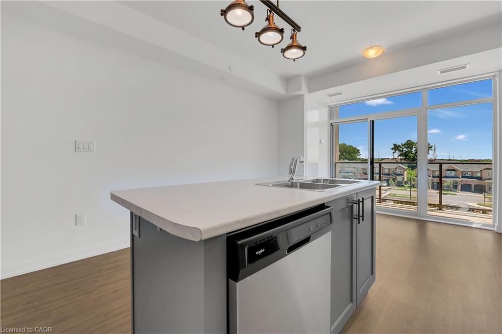 319-450 Dundas Street, Waterdown, ON - Indoor Photo Showing Kitchen With Double Sink