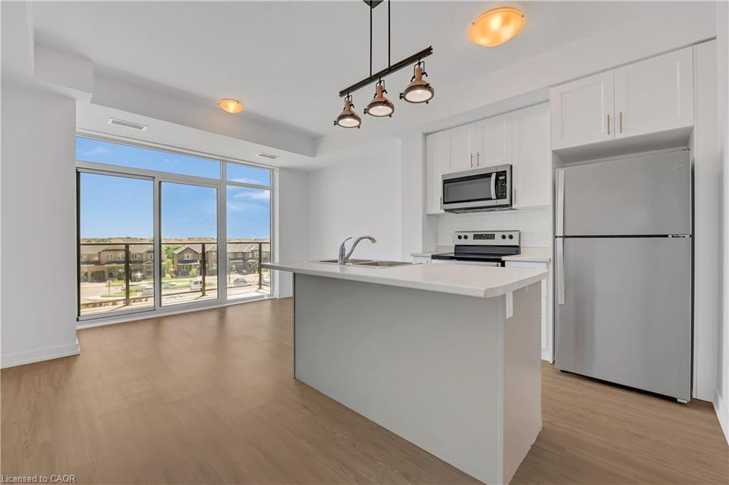 319-450 Dundas Street, Waterdown, ON - Indoor Photo Showing Kitchen With Stainless Steel Kitchen With Upgraded Kitchen