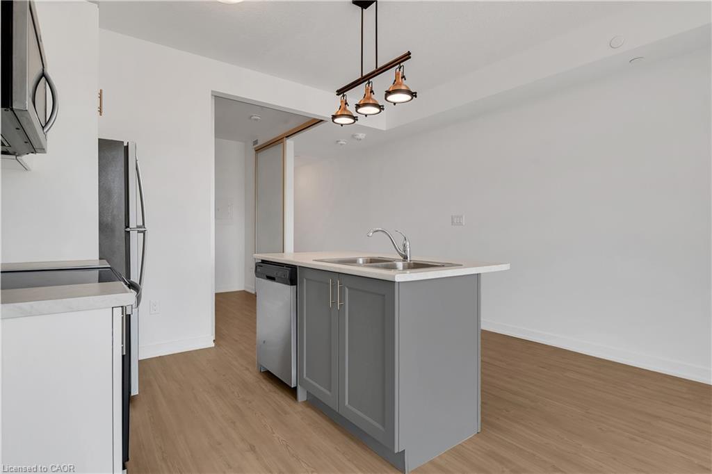 319-450 Dundas Street, Waterdown, ON - Indoor Photo Showing Kitchen With Double Sink