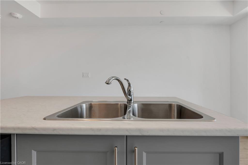 319-450 Dundas Street, Waterdown, ON - Indoor Photo Showing Kitchen With Double Sink