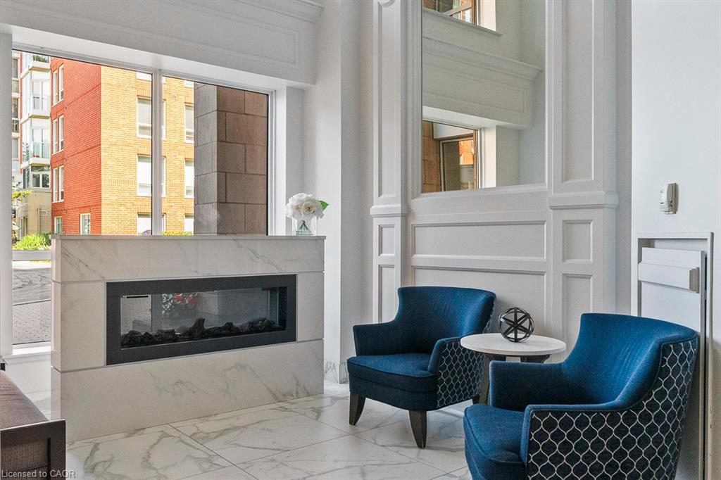 103-40 Old Mill Road, Oakville, ON - Indoor Photo Showing Living Room With Fireplace