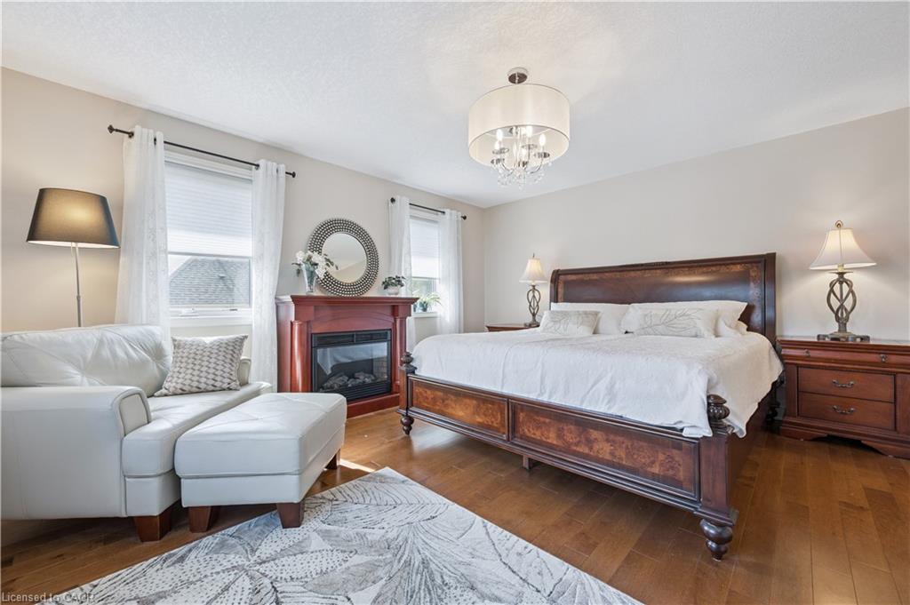 867 Creekside Drive, Waterloo, ON - Indoor Photo Showing Bedroom With Fireplace