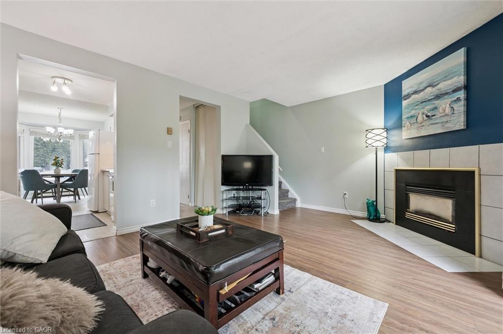 41-219 Kingswood Drive, Kitchener, ON - Indoor Photo Showing Living Room With Fireplace