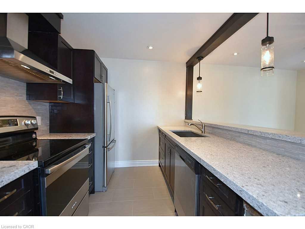 821-1450 Glen Abbey Gate, Oakville, ON - Indoor Photo Showing Kitchen With Stainless Steel Kitchen With Upgraded Kitchen