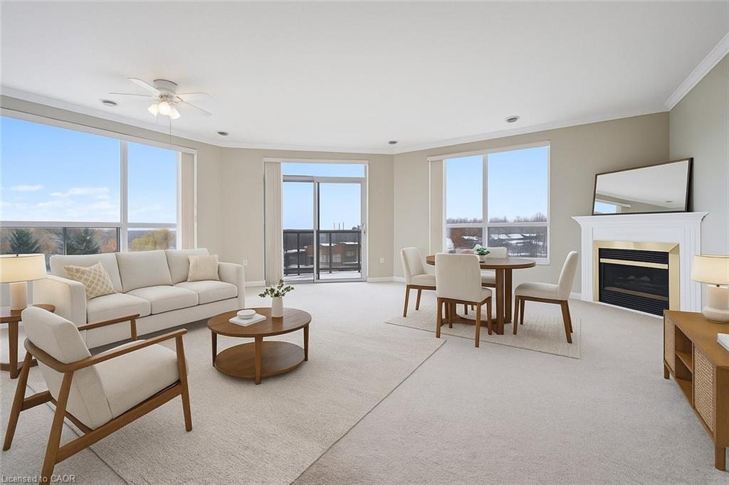 706-255 Keats Way, Waterloo, ON - Indoor Photo Showing Living Room With Fireplace