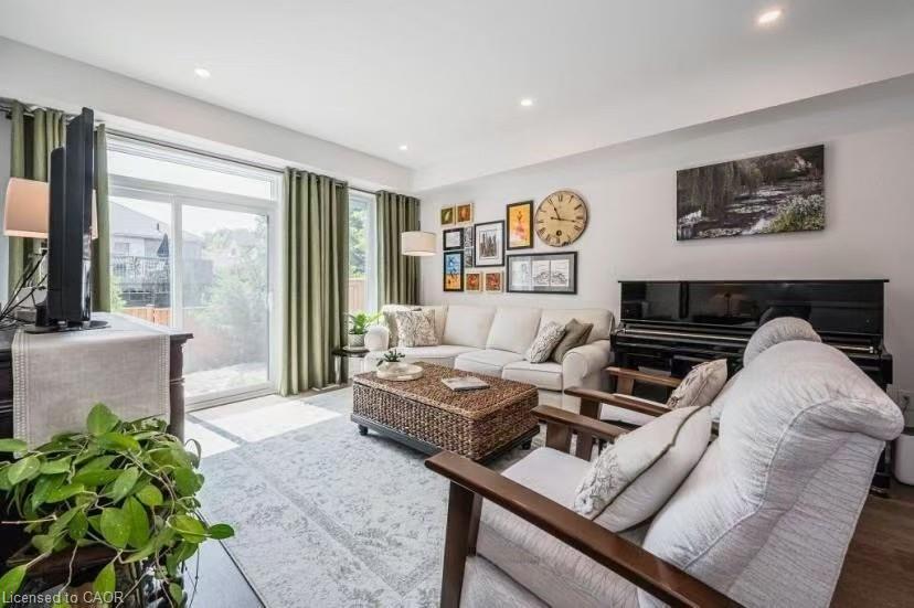 22-350 River Road, Cambridge, ON - Indoor Photo Showing Living Room With Fireplace
