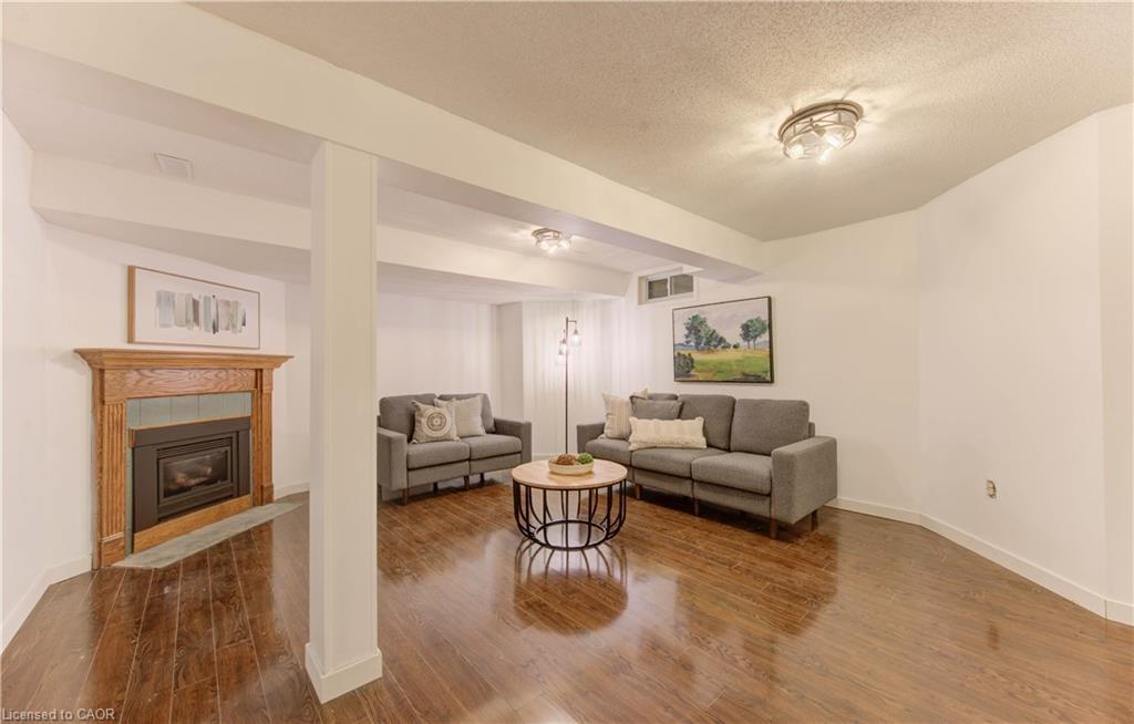 28-10 Holborn Court, Kitchener, ON - Indoor Photo Showing Other Room With Fireplace