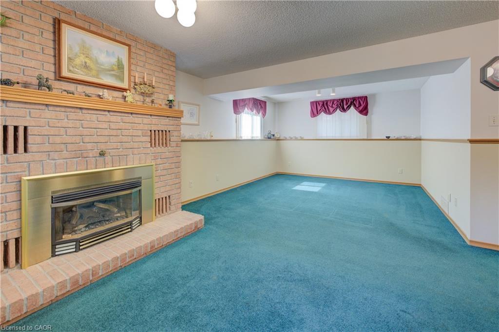 489 Northlake Drive, Waterloo, ON - Indoor Photo Showing Other Room With Fireplace