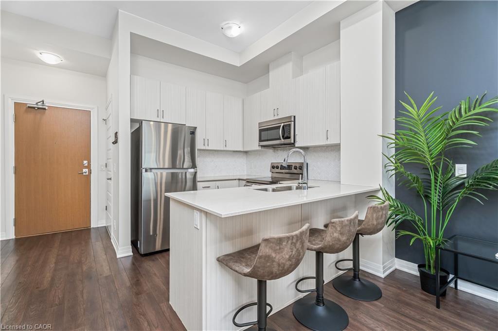 627-1105 Leger Way, Milton, ON - Indoor Photo Showing Kitchen With Double Sink