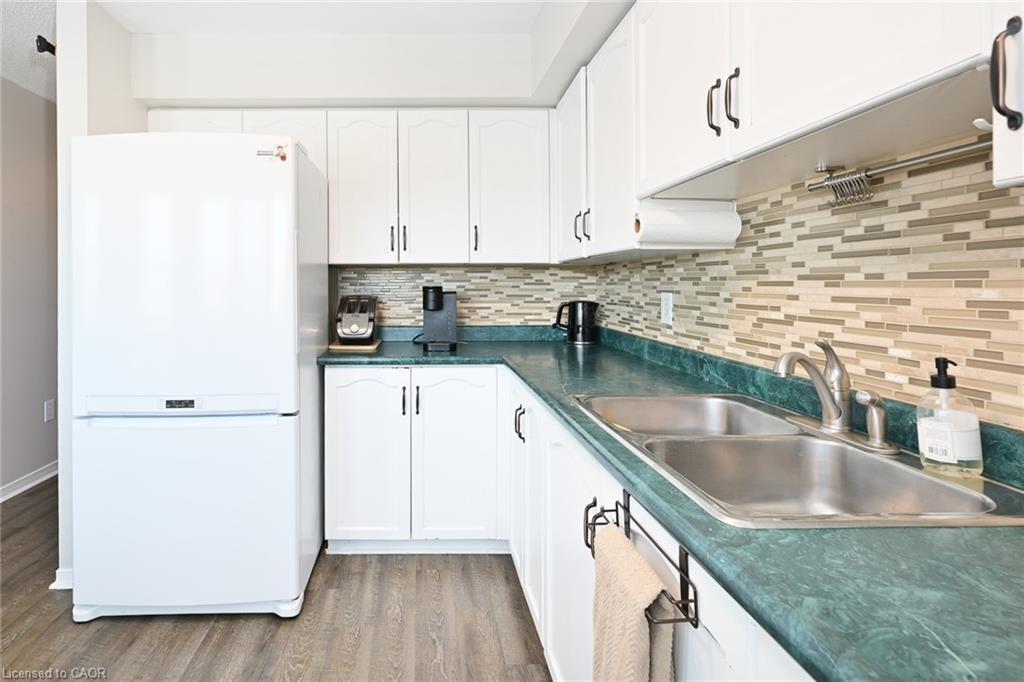 209-511 Highway 8 Street, Stoney Creek, ON - Indoor Photo Showing Kitchen With Double Sink