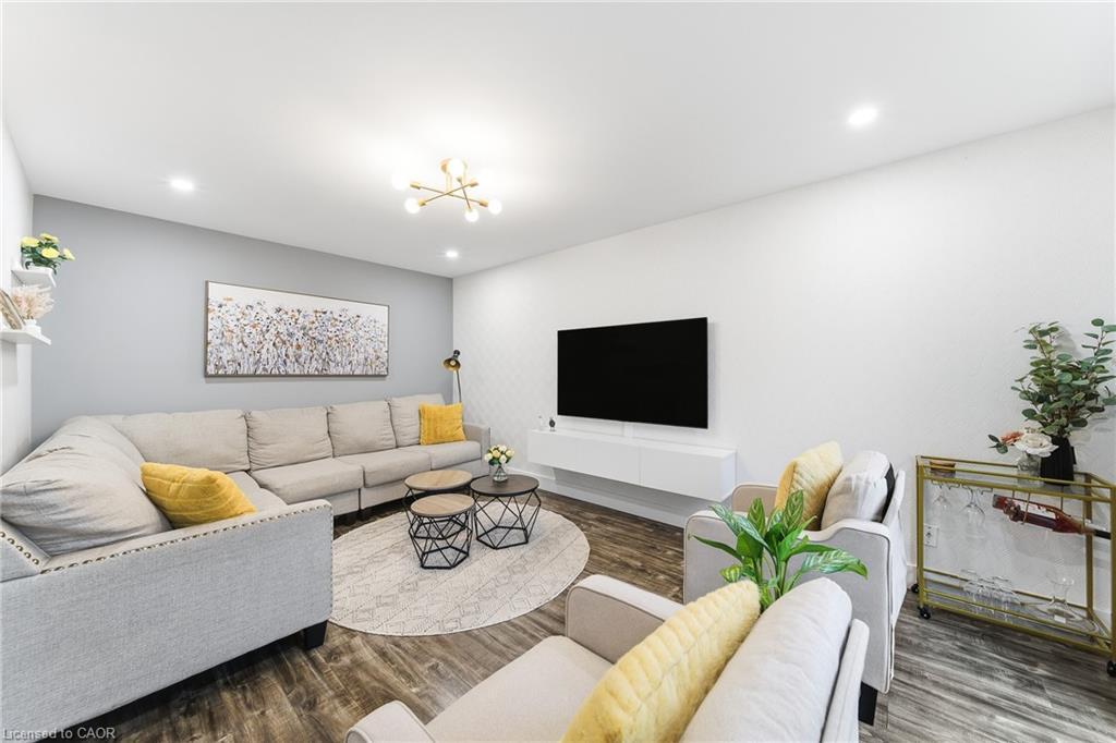 23 Stonegate Drive, Kitchener, ON - Indoor Photo Showing Living Room With Fireplace
