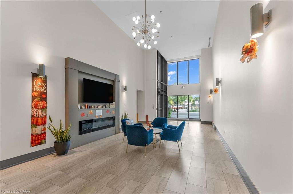 231-50 Herrick Avenue, St. Catharines, ON - Indoor Photo Showing Other Room With Fireplace