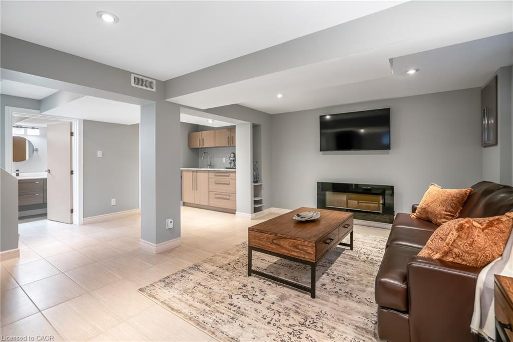 4 Upper Canada Drive, St. Catharines, ON - Indoor Photo Showing Living Room With Fireplace
