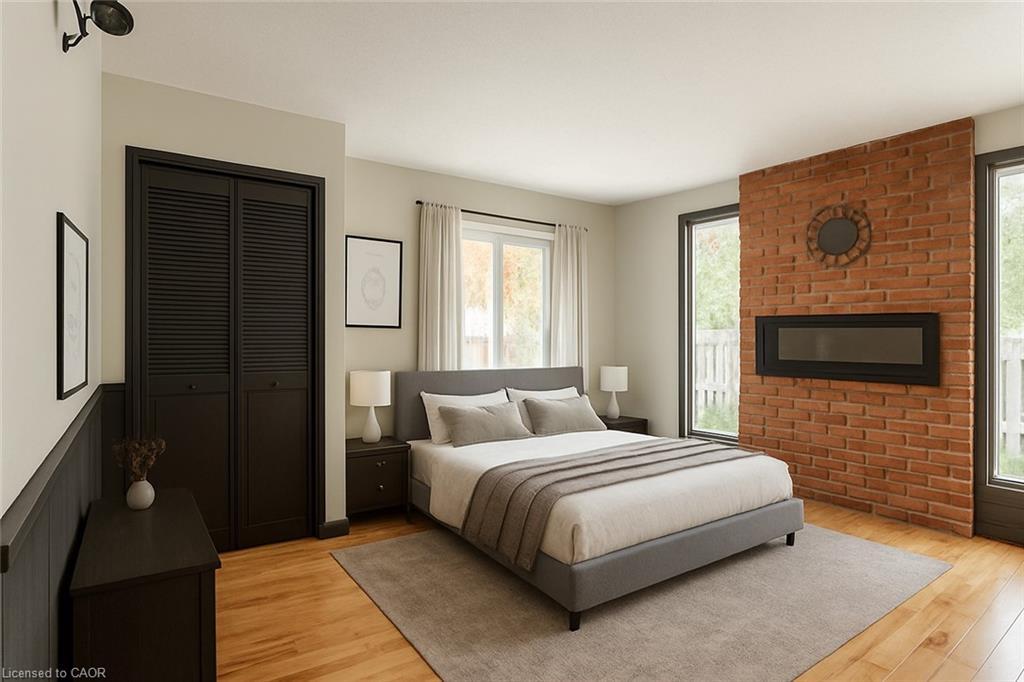 65 Banff Street, Caledonia, ON - Indoor Photo Showing Bedroom With Fireplace