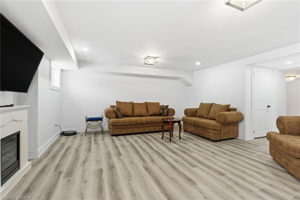 1576 Woodburn Road, Binbrook, ON - Indoor Photo Showing Other Room With Fireplace