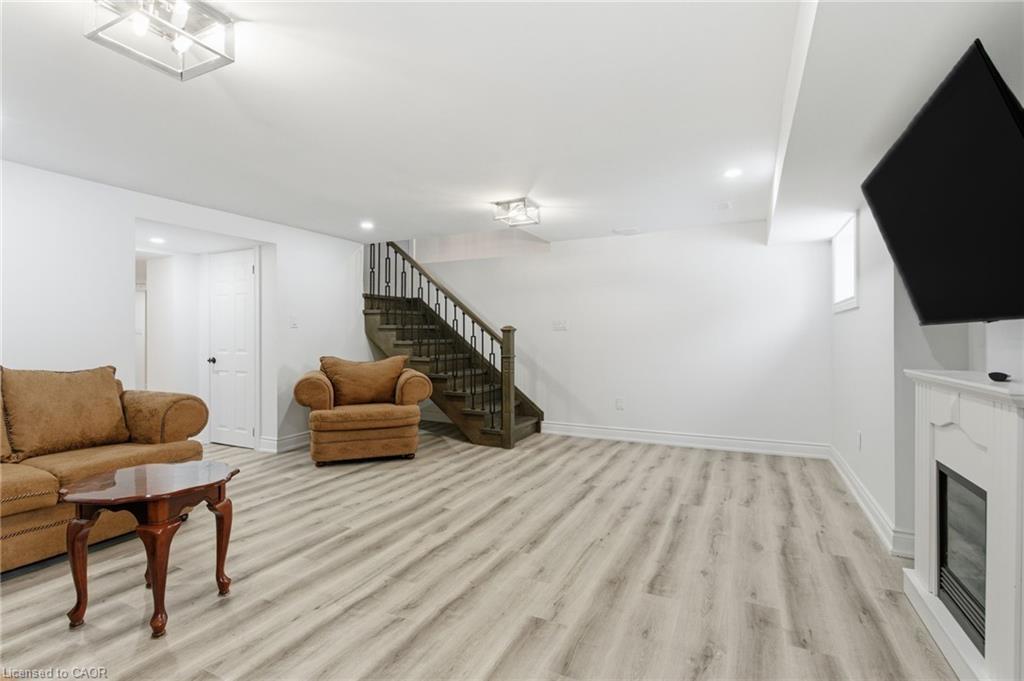 1576 Woodburn Road, Binbrook, ON - Indoor Photo Showing Other Room With Fireplace