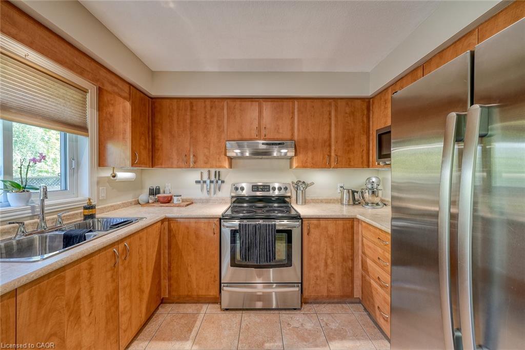 11 Talon Drive, Woodstock, ON - Indoor Photo Showing Kitchen With Stainless Steel Kitchen With Double Sink