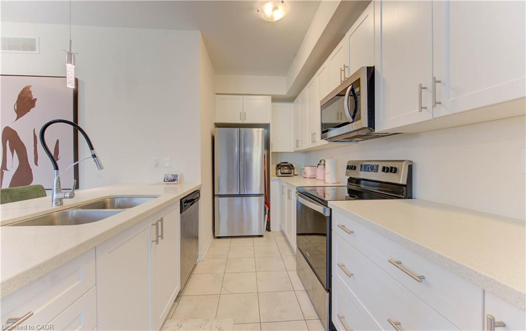 B-385 Westwood Drive, Kitchener, ON - Indoor Photo Showing Kitchen With Stainless Steel Kitchen With Double Sink
