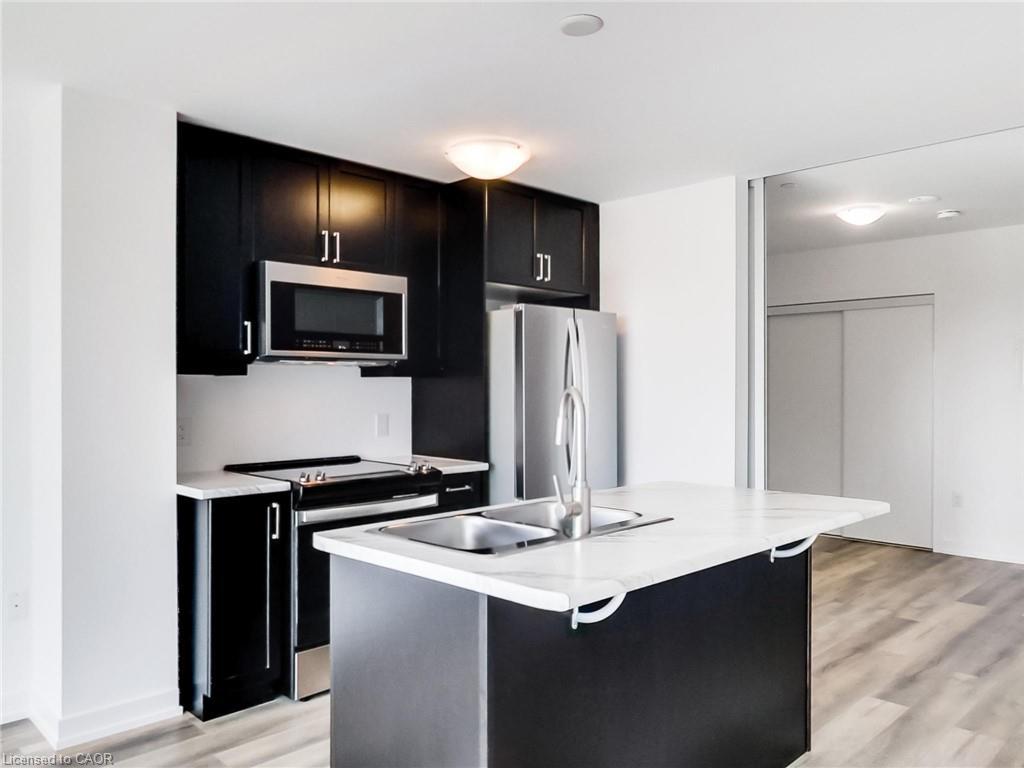 811-470 Dundas Street E, Waterdown, ON - Indoor Photo Showing Kitchen With Double Sink