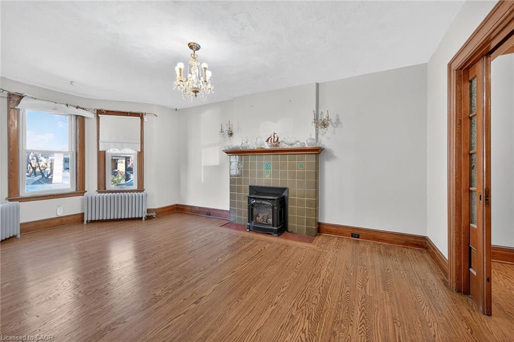 103 Leinster Avenue S, Hamilton, ON - Indoor Photo Showing Living Room With Fireplace
