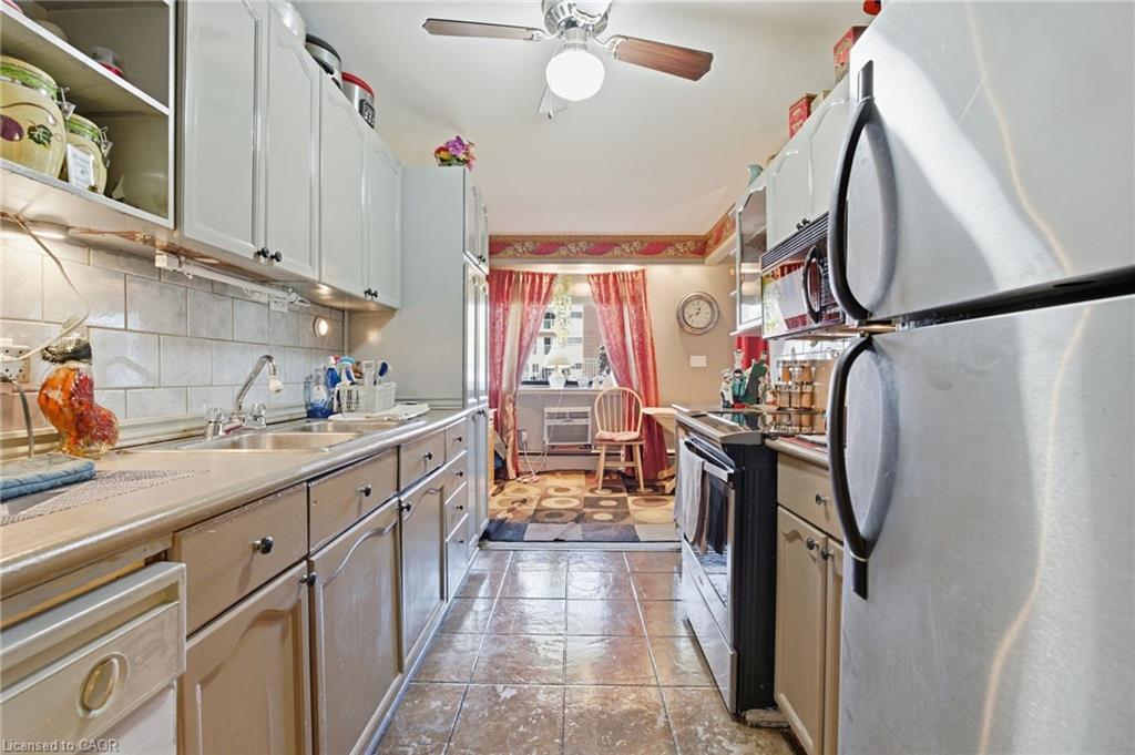 103-510 Queenston Road, Hamilton, ON - Indoor Photo Showing Kitchen With Double Sink