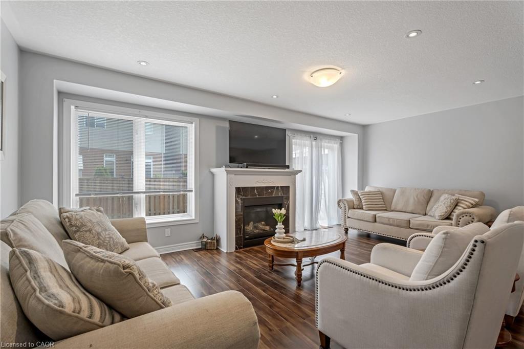 28 Charleswood Crescent, Hamilton, ON - Indoor Photo Showing Living Room With Fireplace