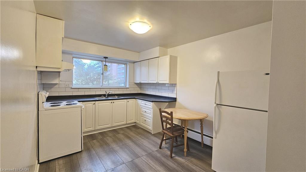 3-357 Connaught Street, Kitchener, ON - Indoor Photo Showing Kitchen With Double Sink