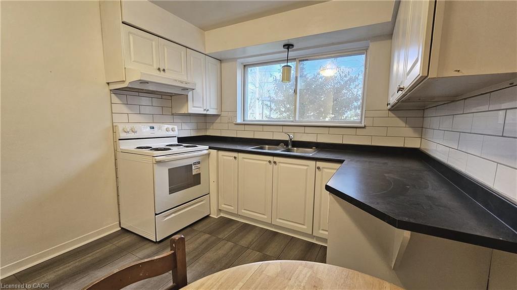 3-357 Connaught Street, Kitchener, ON - Indoor Photo Showing Kitchen With Double Sink